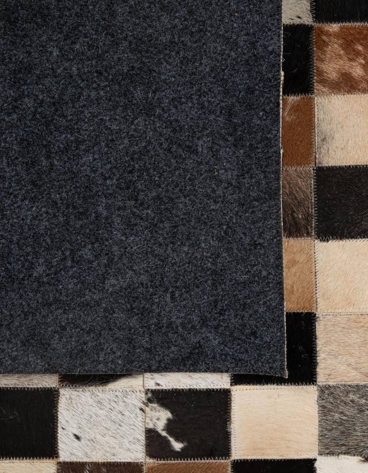 Detail image of  5' 2 x 8' 1 Cowhide - Patchwork Rug