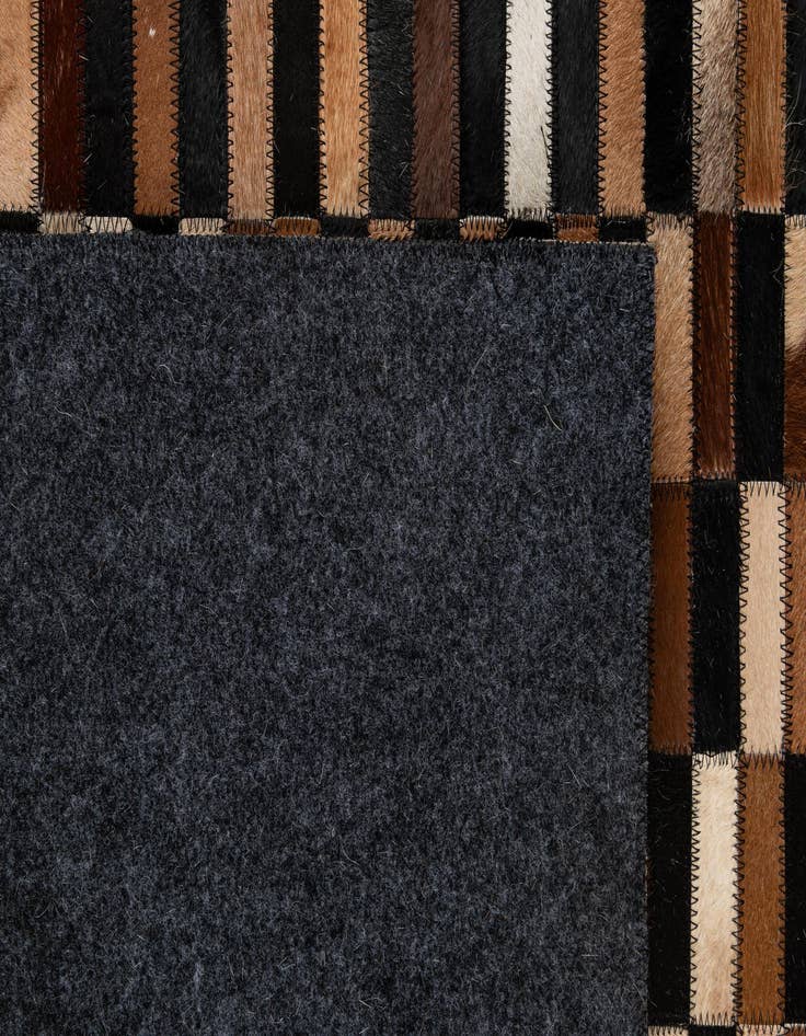 Detail image of  5' 2 x 8' 1 Cowhide - Patchwork Rug