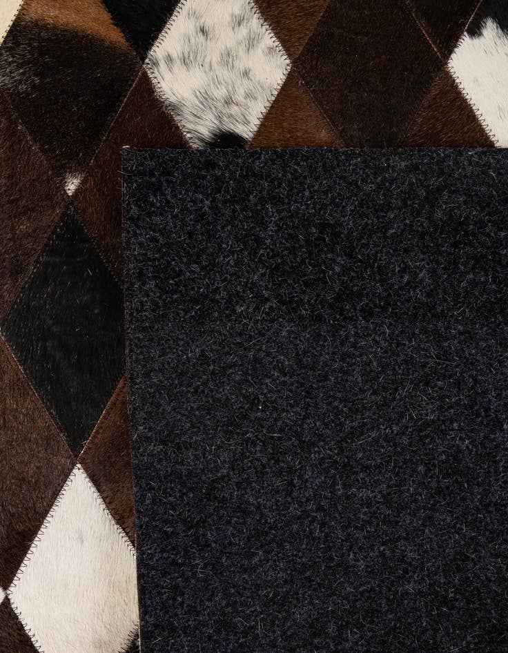 Detail image of  5' 9 x 8' 1 Cowhide - Patchwork Rug