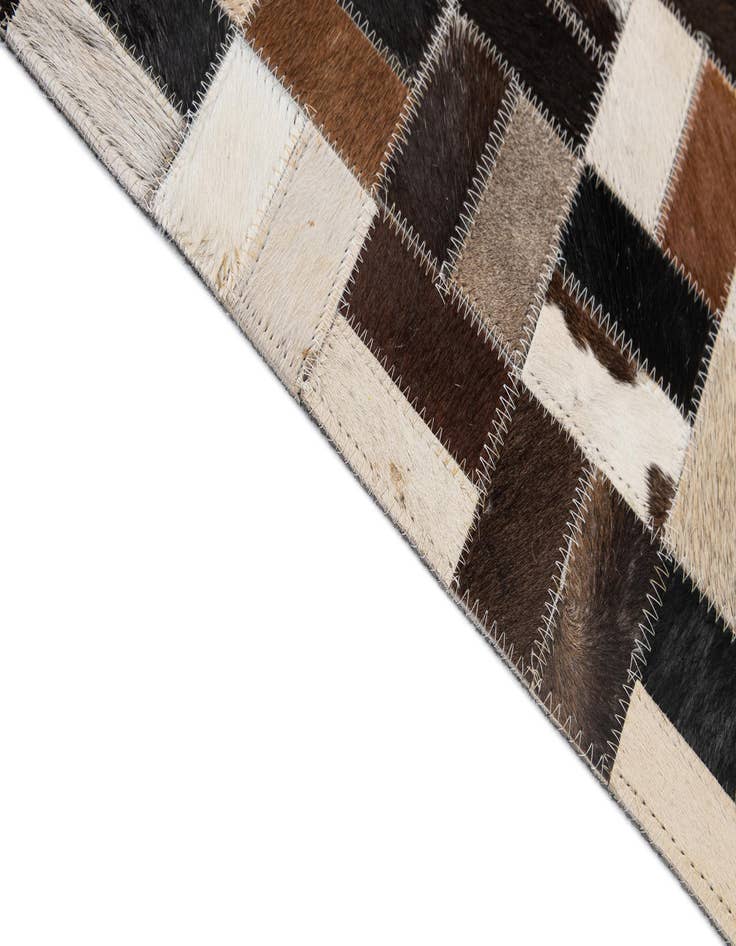 Detail image of  5' 1 x 8' Cowhide - Patchwork Rug