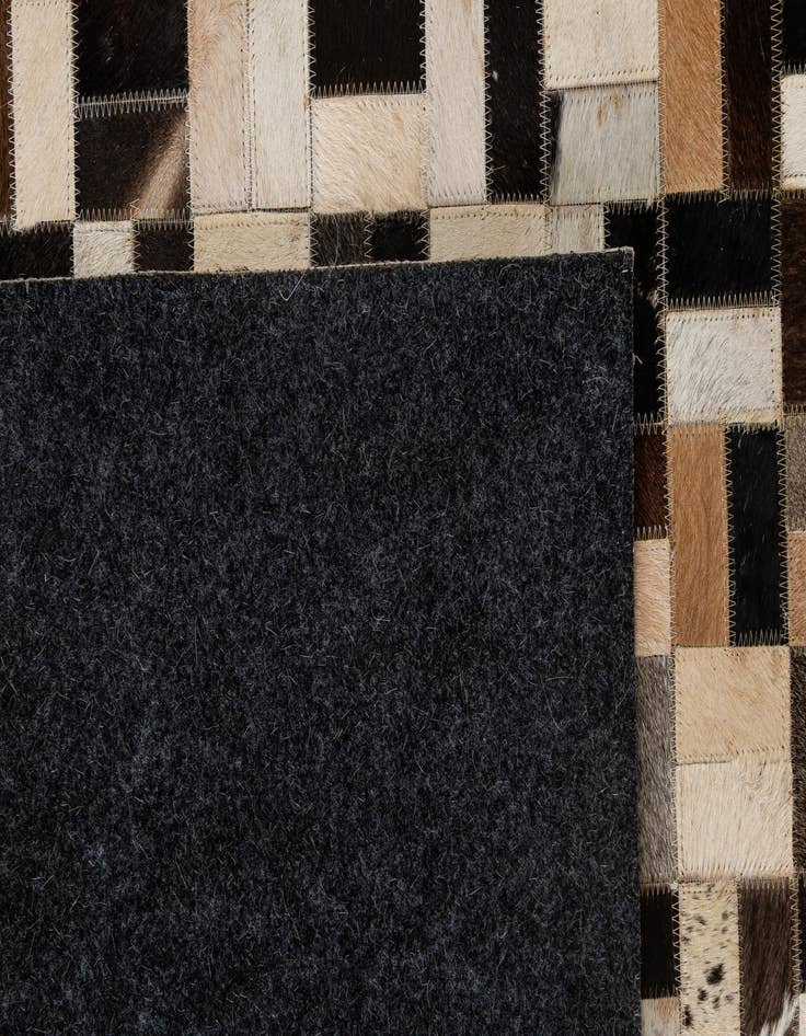 Detail image of  5' 1 x 8' Cowhide - Patchwork Rug