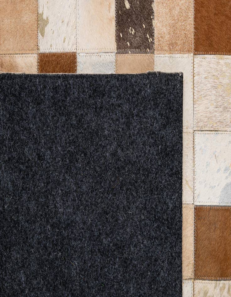 Detail image of  5' 1 x 8' Cowhide - Patchwork Rug