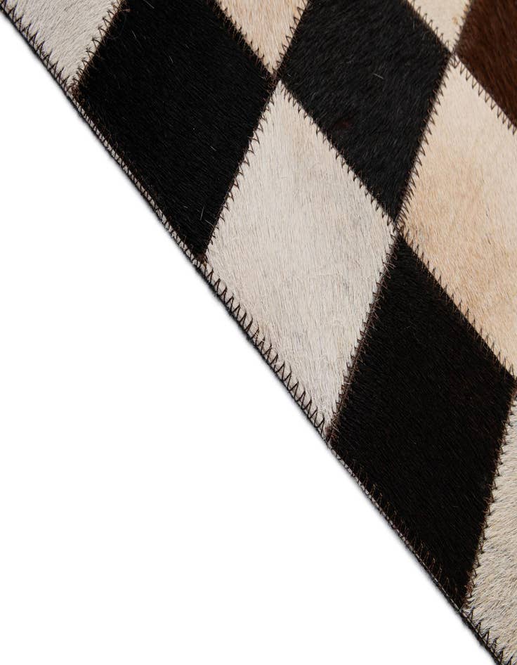 Detail image of  4' 11 x 8' 1 Cowhide - Patchwork Rug