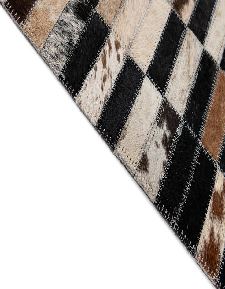 Detail image of  5' 3 x 8' Cowhide - Patchwork Rug