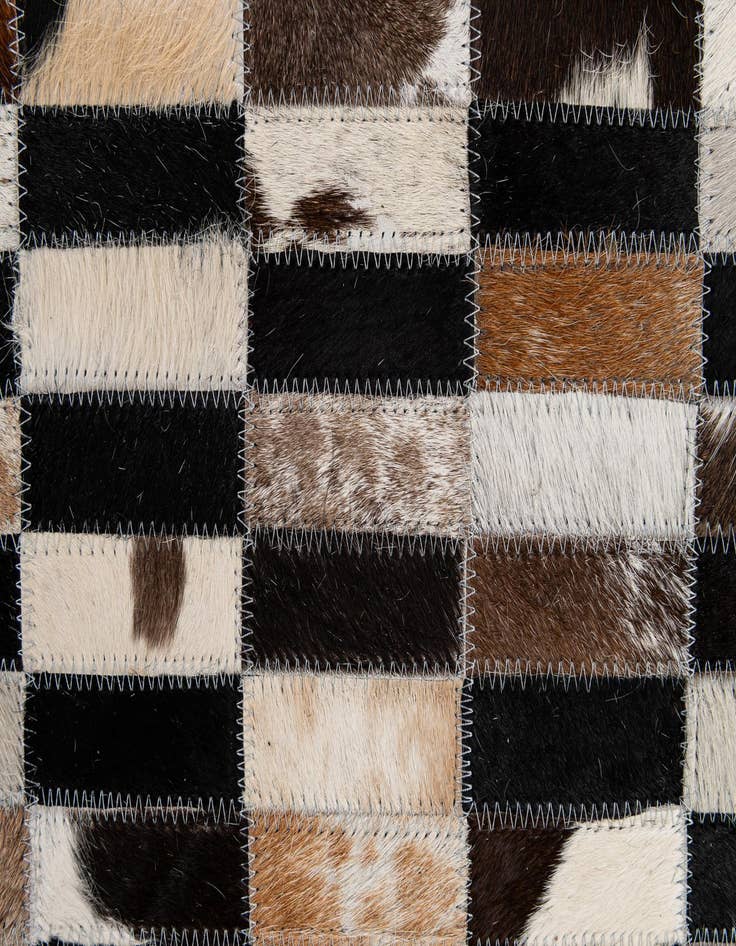 Detail image of  5' 3 x 8' Cowhide - Patchwork Rug