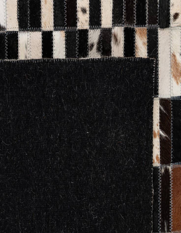 Detail image of  5' 3 x 8' Cowhide - Patchwork Rug