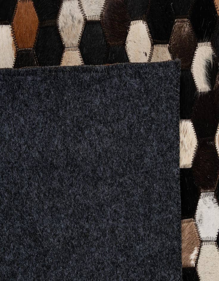 Detail image of  5' 2 x 8' Cowhide - Patchwork Rug