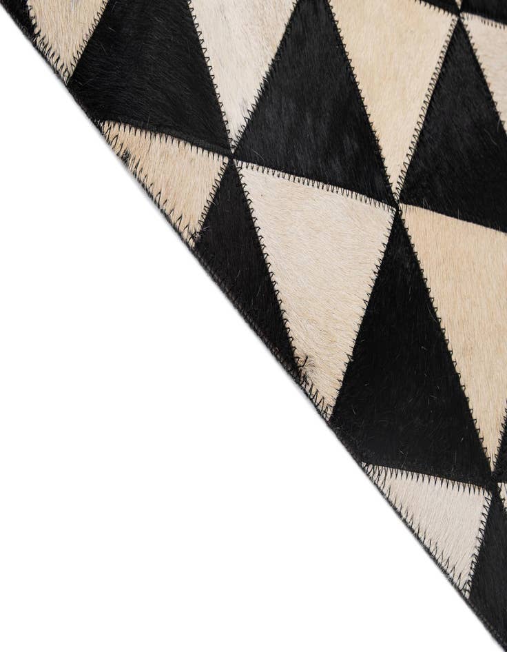 Detail image of  5' 2 x 8' 2 Cowhide - Patchwork Rug