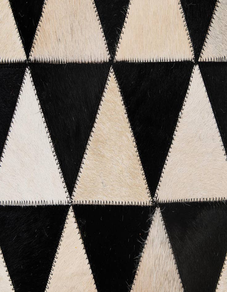 Detail image of  5' 2 x 8' 2 Cowhide - Patchwork Rug