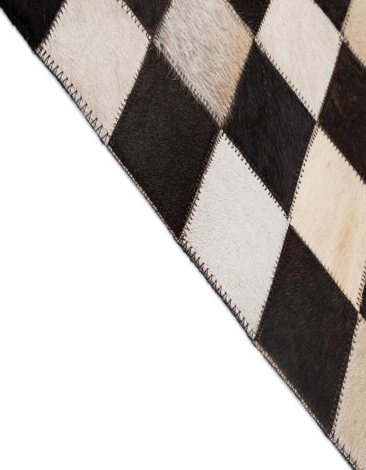 Detail image of  4' 11 x 8' Cowhide - Patchwork Rug