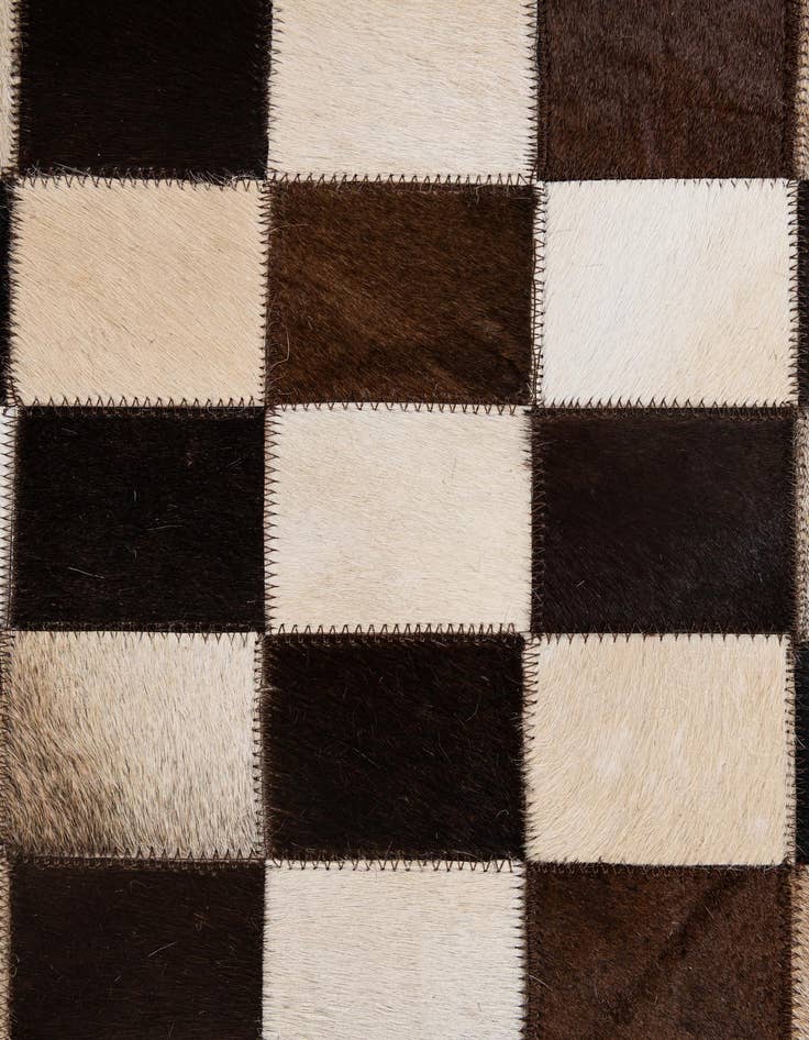 Detail image of  4' 11 x 8' Cowhide - Patchwork Rug