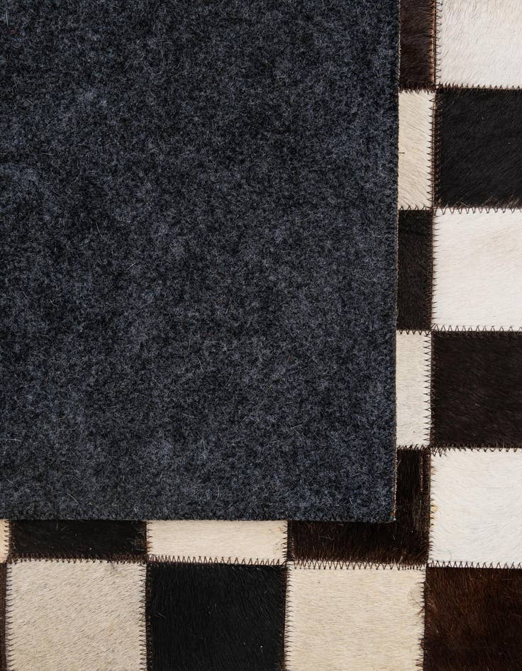 Detail image of  4' 11 x 8' Cowhide - Patchwork Rug