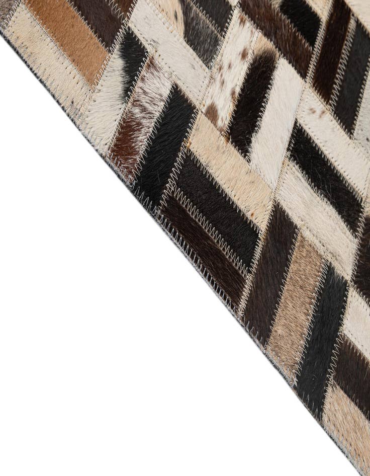 Detail image of  5' x 7' 11 Cowhide - Patchwork Rug