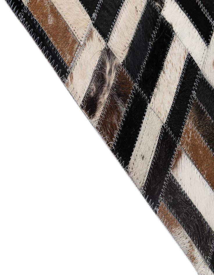 Detail image of  5' 1 x 8' Cowhide - Patchwork Rug