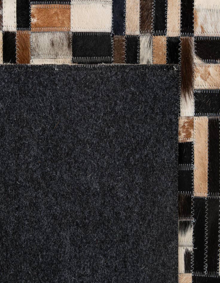 Detail image of  5' 1 x 8' Cowhide - Patchwork Rug