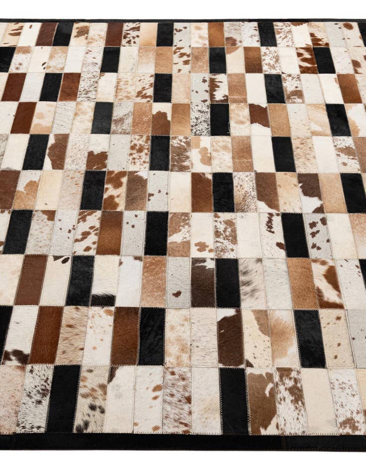 Detail image of  5' 1 x 7' 11 Cowhide - Patchwork Rug