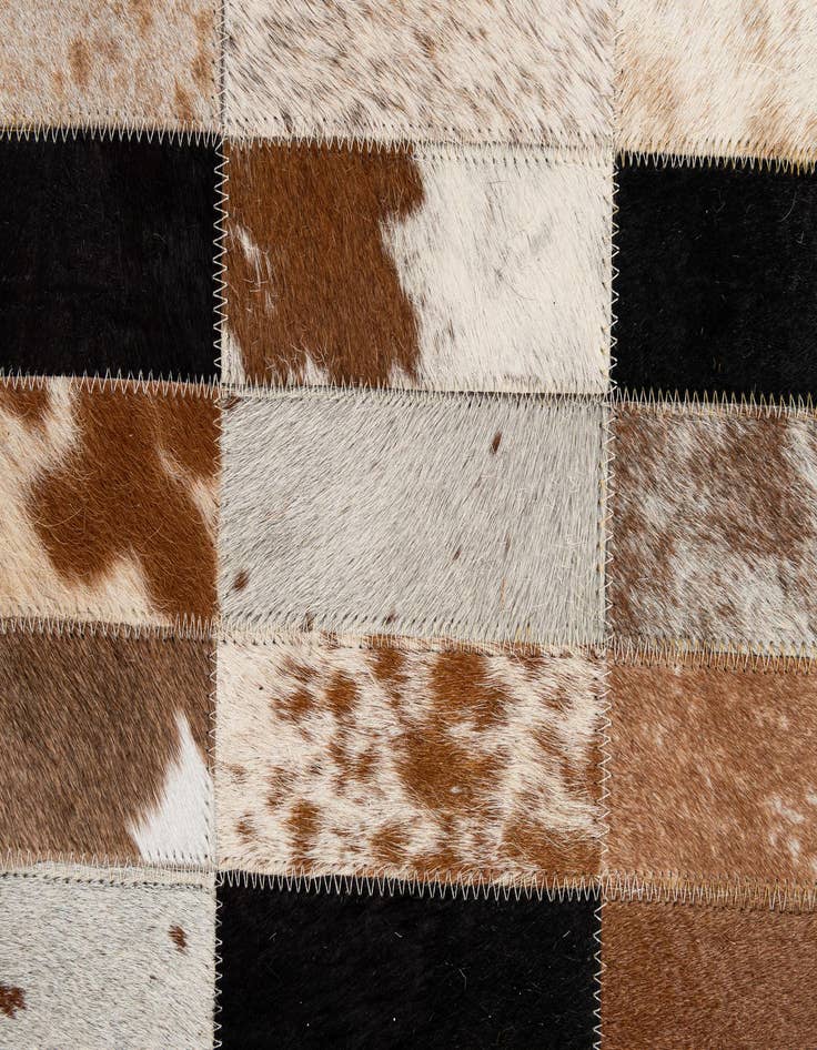 Detail image of  5' 1 x 7' 11 Cowhide - Patchwork Rug