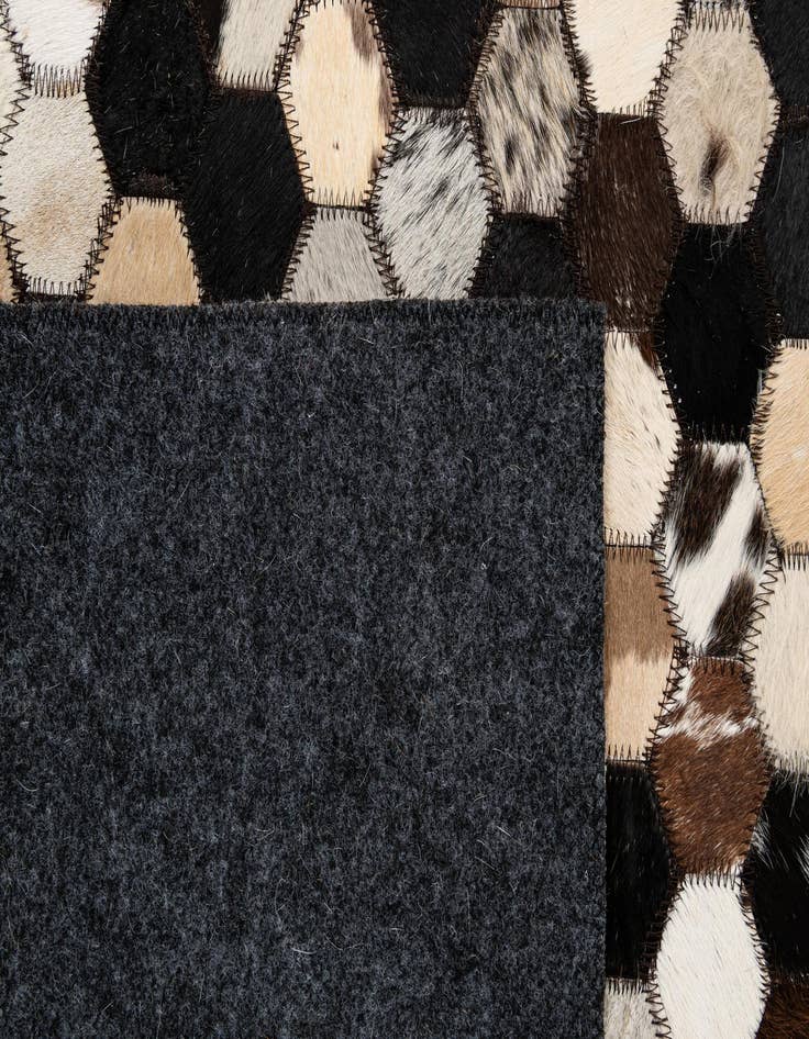 Detail image of  5' 1 x 8' Cowhide - Patchwork Rug