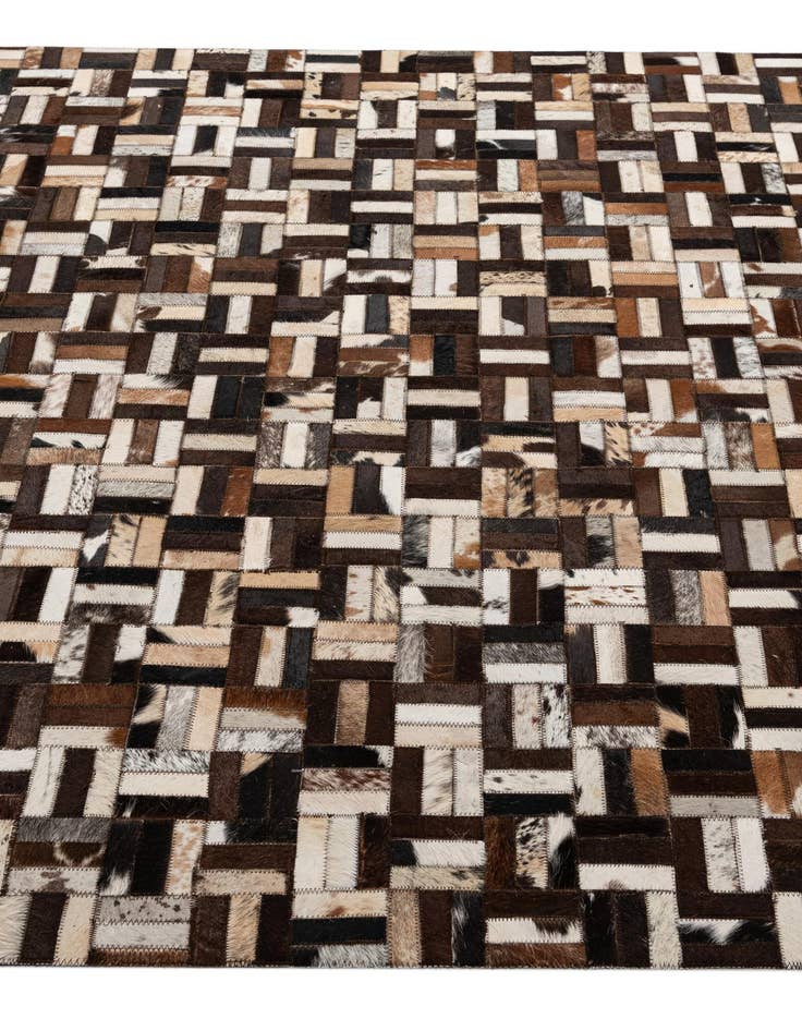 Detail image of  4' 11 x 7' 10 Cowhide - Patchwork Rug