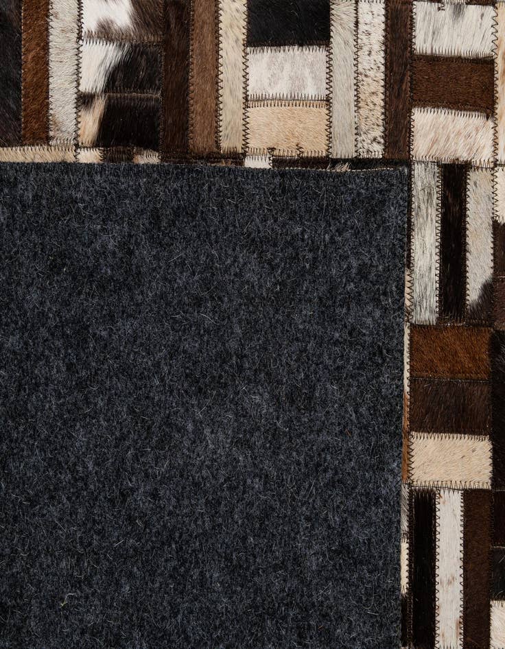 Detail image of  4' 11 x 7' 10 Cowhide - Patchwork Rug