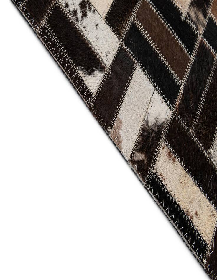 Detail image of  5' x 7' 11 Cowhide - Patchwork Rug