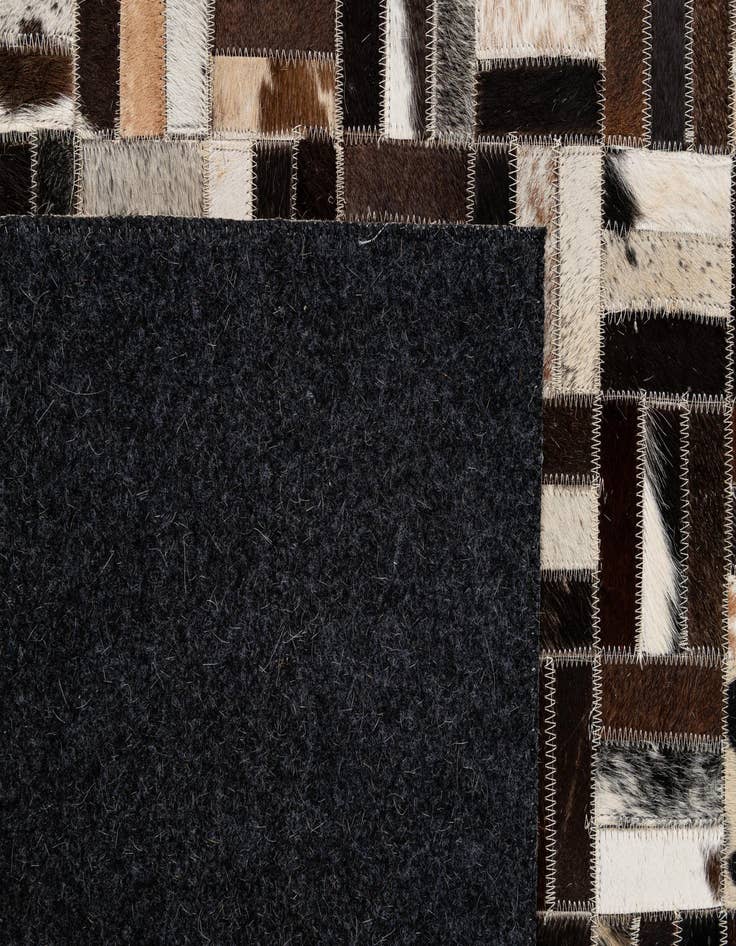 Detail image of  5' x 7' 11 Cowhide - Patchwork Rug