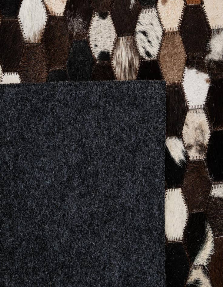 Detail image of  5' 1 x 8' Cowhide - Patchwork Rug