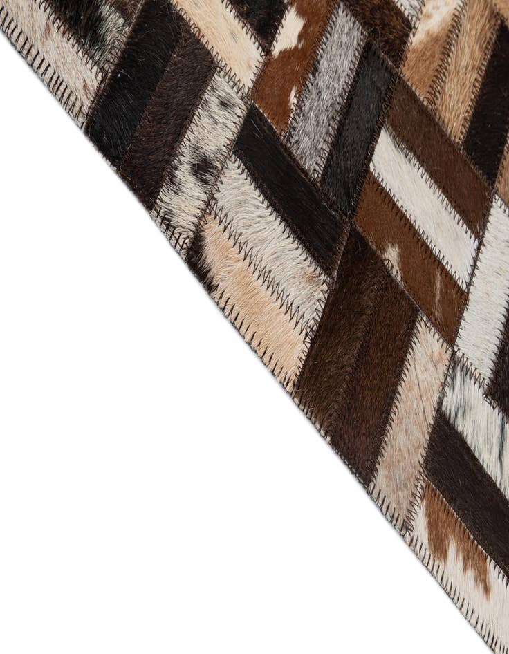 Detail image of  5' x 7' 11 Cowhide - Patchwork Rug