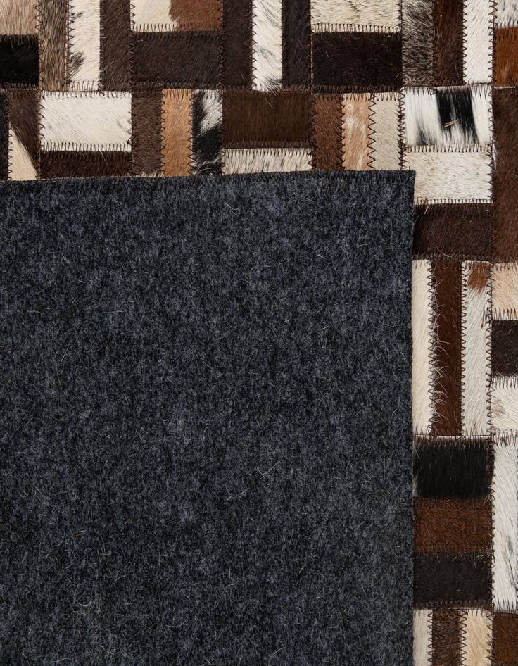 Detail image of  5' x 7' 11 Cowhide - Patchwork Rug