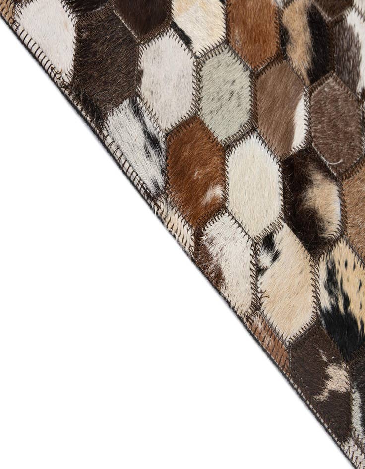 Detail image of  5' 1 x 7' 11 Cowhide - Patchwork Rug