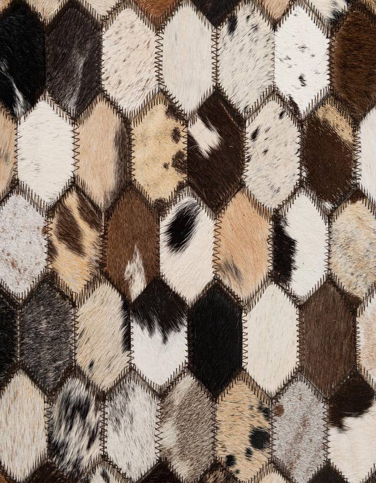 Detail image of  5' 1 x 7' 11 Cowhide - Patchwork Rug