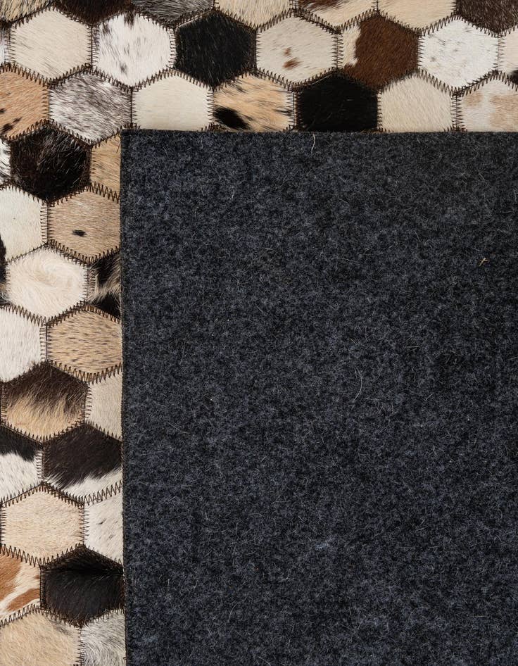 Detail image of  5' 1 x 7' 11 Cowhide - Patchwork Rug
