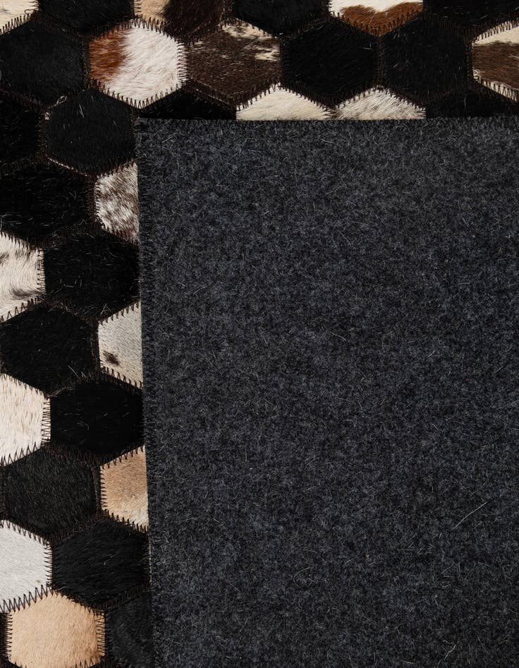 Detail image of  5' x 7' 11 Cowhide - Patchwork Rug