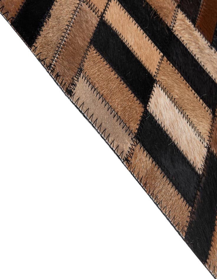 Detail image of  5' x 7' 11 Cowhide - Patchwork Rug