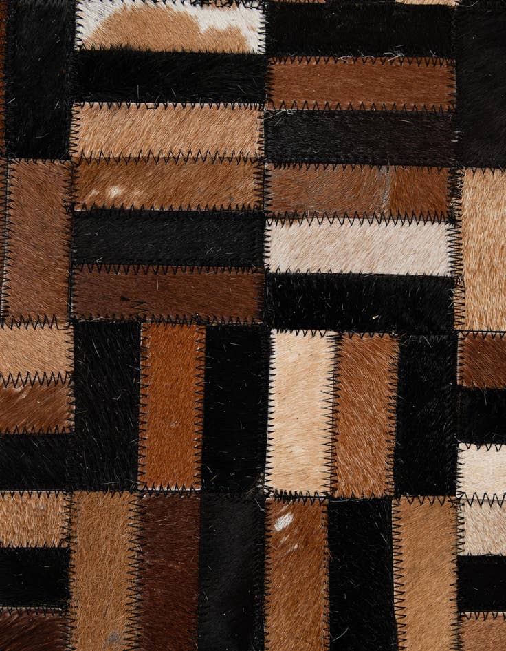 Detail image of  5' x 7' 11 Cowhide - Patchwork Rug