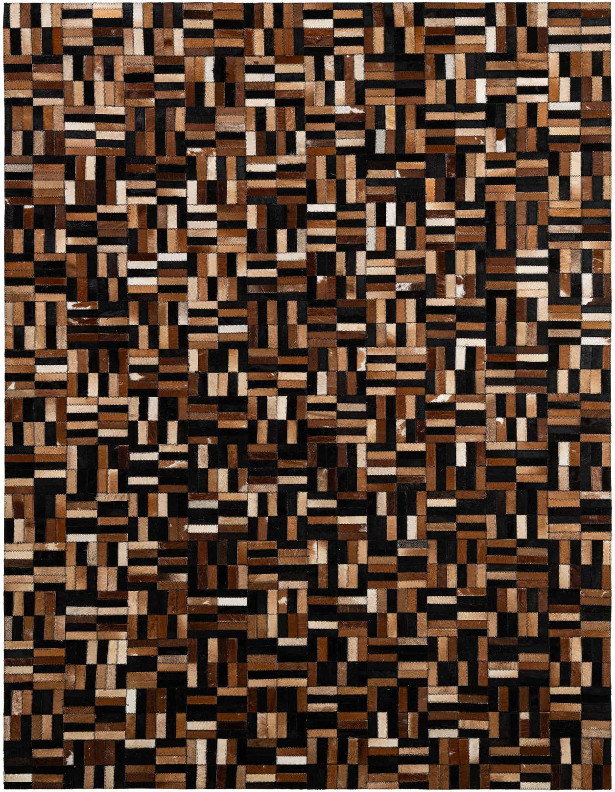 A rectangular 5x8 cowhide patchwork rug with a modern stripe pattern in various shades of brown, black, and cream.