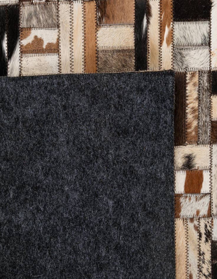 Detail image of  5' x 7' 11 Cowhide - Patchwork Rug