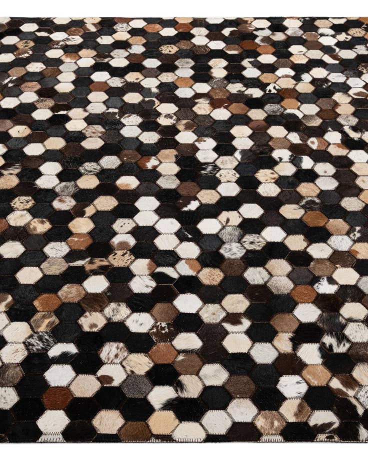 Detail image of  5' 1 x 7' 11 Cowhide - Patchwork Rug
