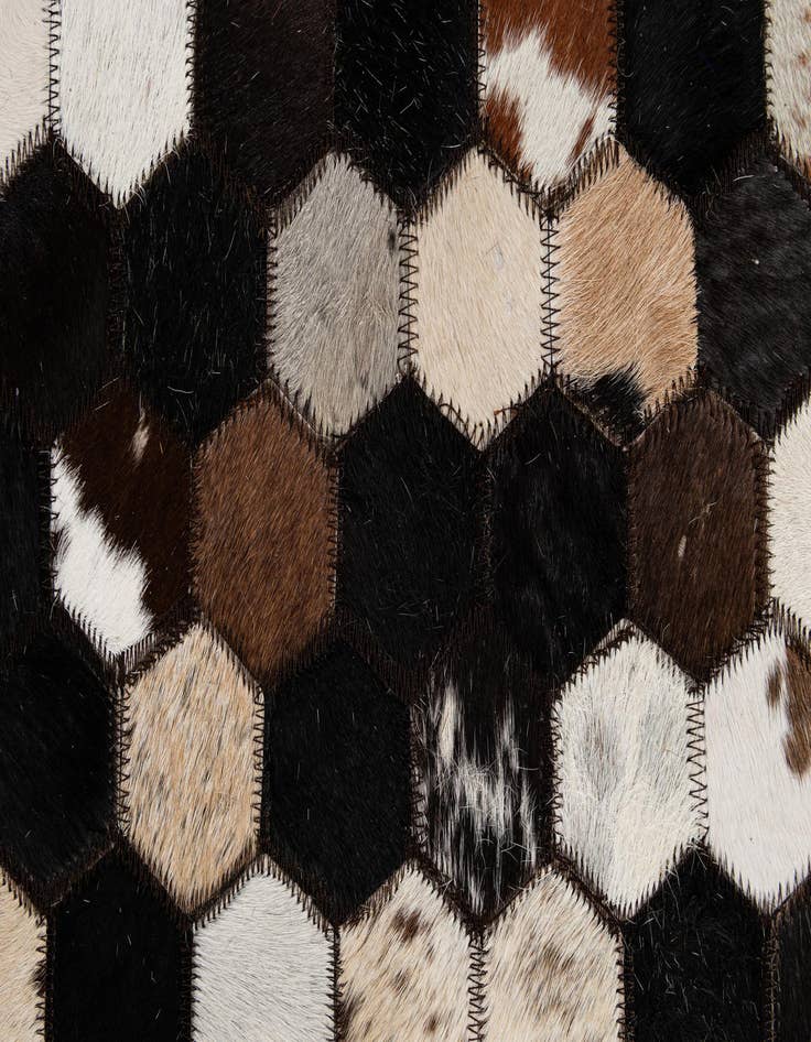 Detail image of  5' 1 x 7' 11 Cowhide - Patchwork Rug