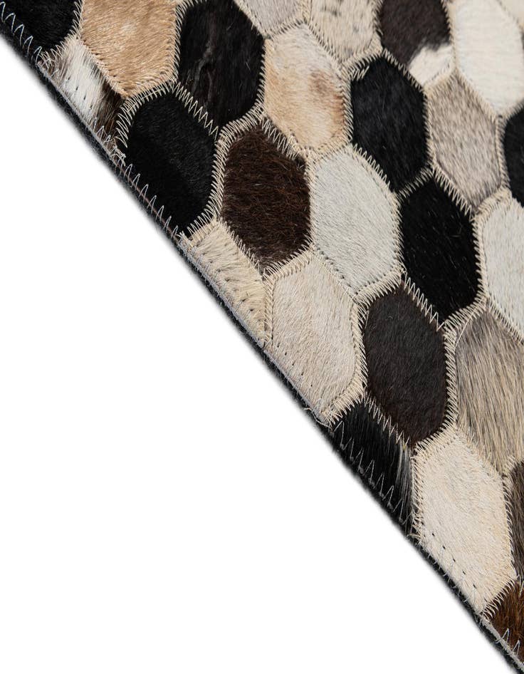 Detail image of  5' x 7' 11 Cowhide - Patchwork Rug