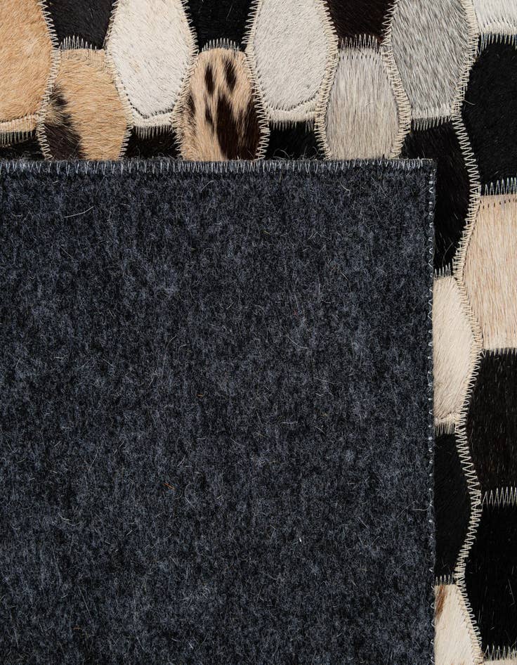 Detail image of  5' x 7' 11 Cowhide - Patchwork Rug