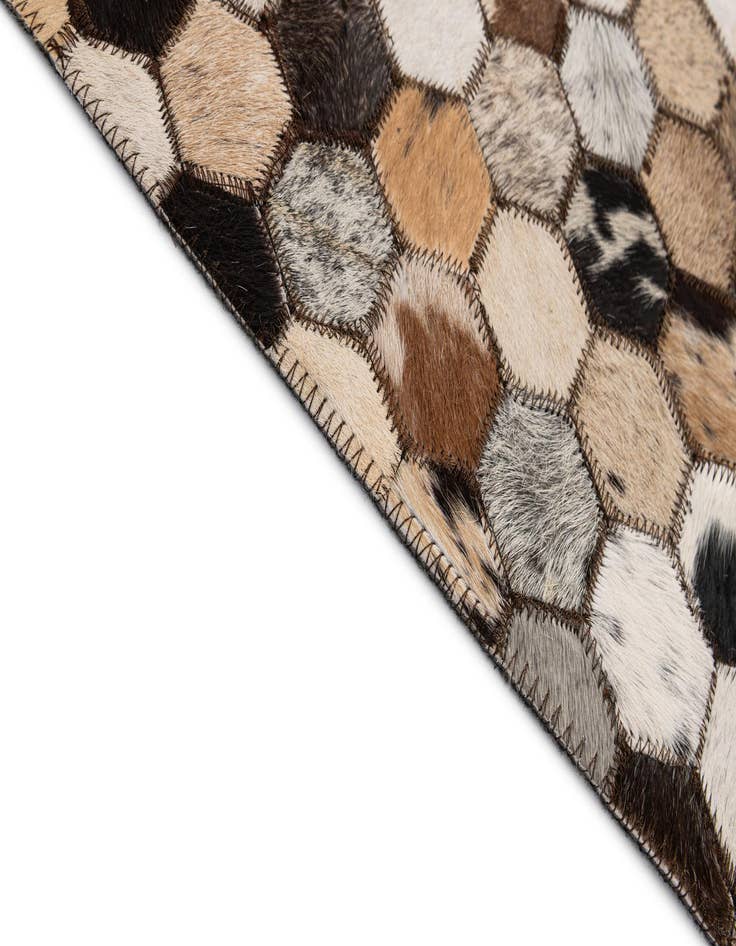 Detail image of  5' 1 x 7' 11 Cowhide - Patchwork Rug