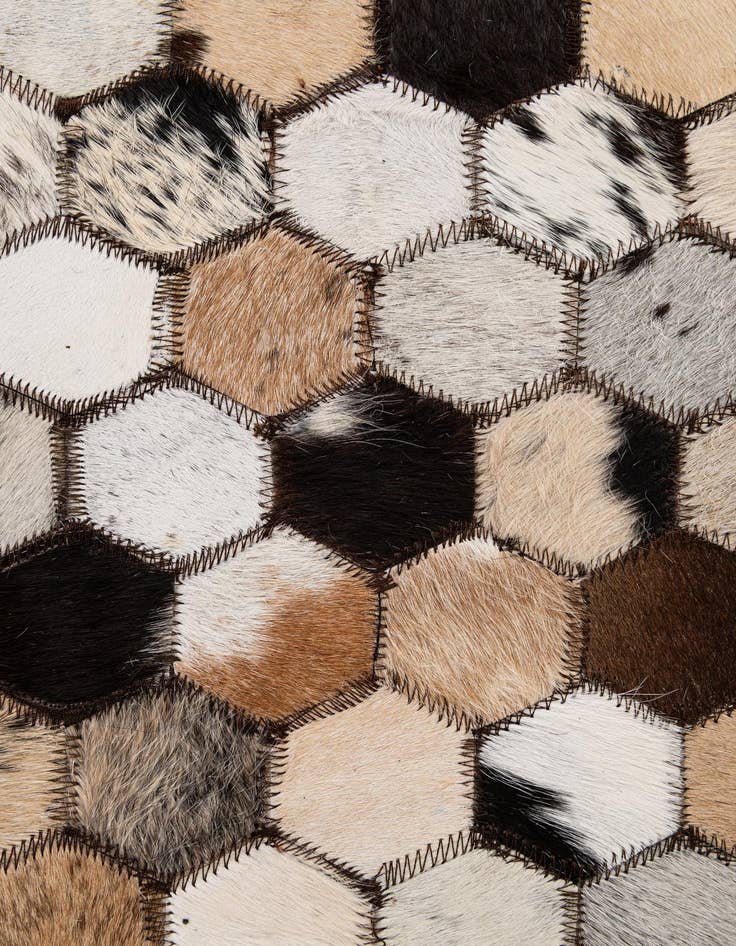 Detail image of  5' 1 x 7' 11 Cowhide - Patchwork Rug
