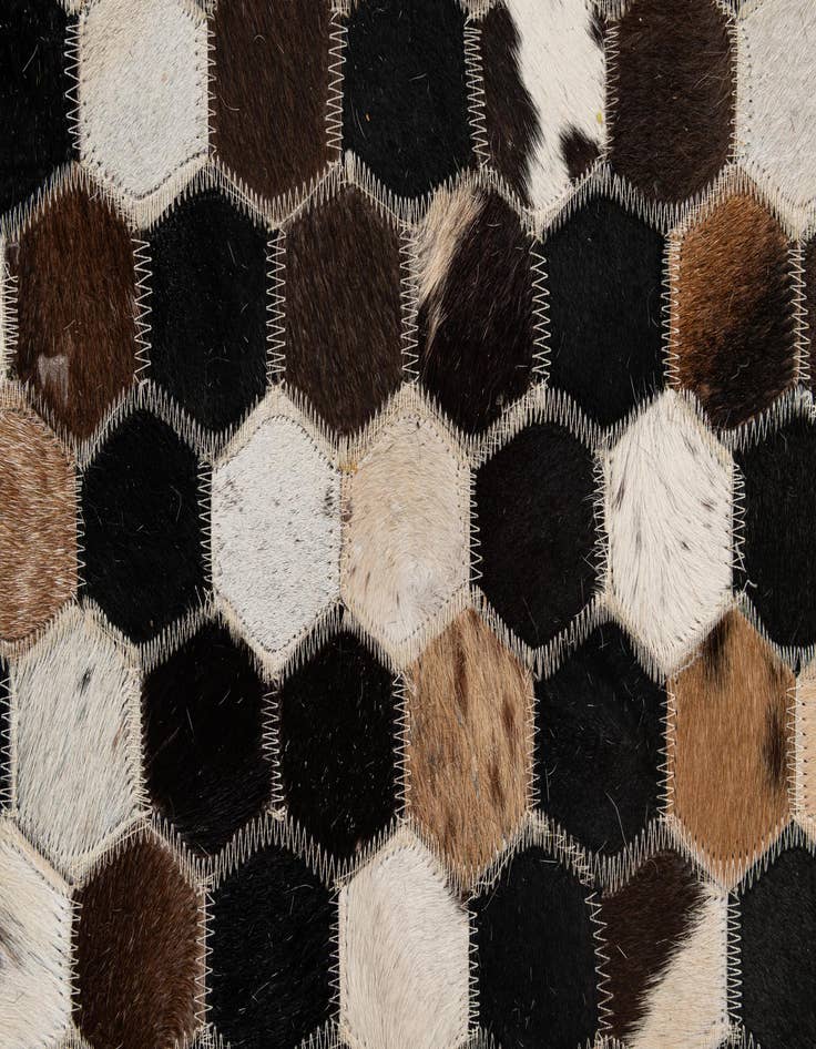Detail image of  5' 1 x 8' 1 Cowhide - Patchwork Rug