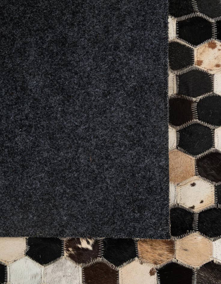 Detail image of  5' 1 x 8' 1 Cowhide - Patchwork Rug