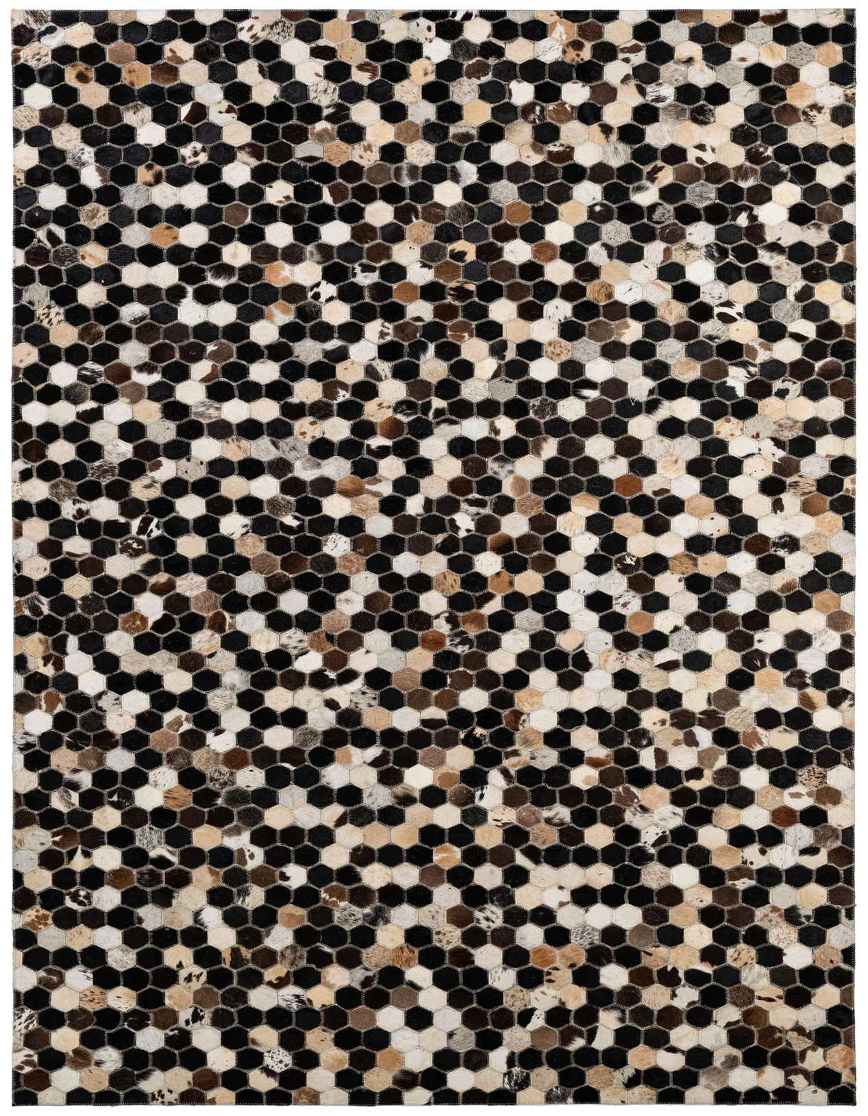 A rectangular 5x8 multi-colored cowhide rug with a modern hexagonal patchwork pattern in black, white, and brown tones.