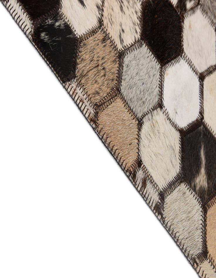 Detail image of  5' x 7' 11 Cowhide - Patchwork Rug
