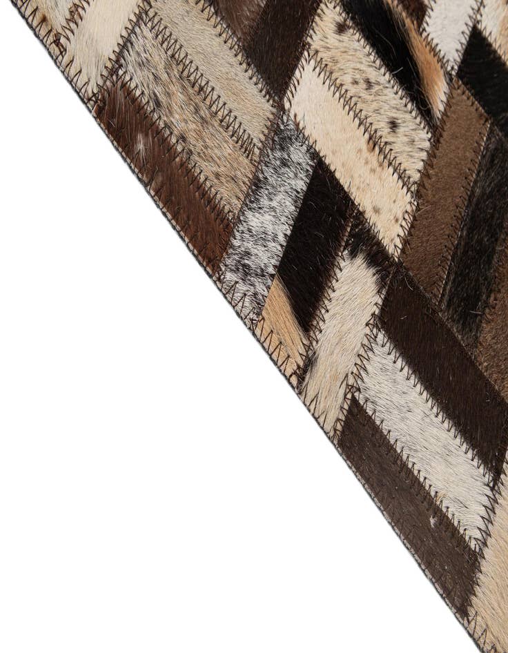 Detail image of  5' 2 x 8' 1 Cowhide - Patchwork Rug