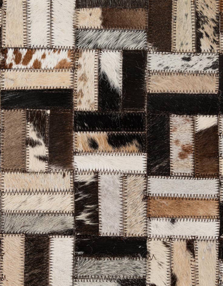 Detail image of  5' 2 x 8' 1 Cowhide - Patchwork Rug