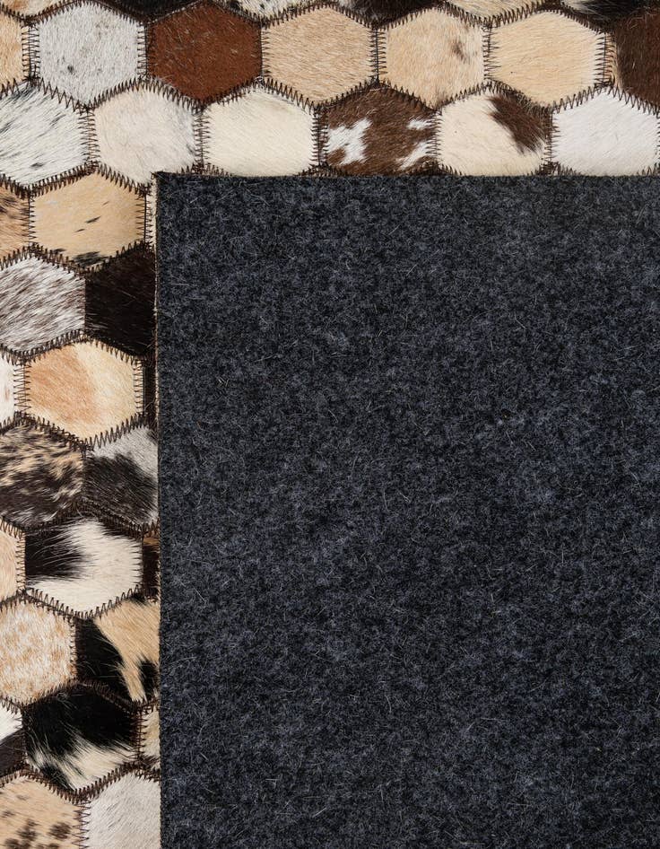 Detail image of  5' x 7' 11 Cowhide - Patchwork Rug